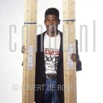 Aaron Winter (Date Unknown) at studio in Amsterdam.

[keywords]Posed, Half Length, Eyecontact, Smiling, Construction material[/keywords]